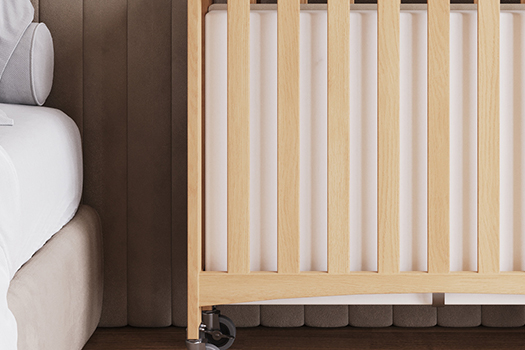 Foundations Travel Sleeper includes a mattress that is stored inside crib when folded